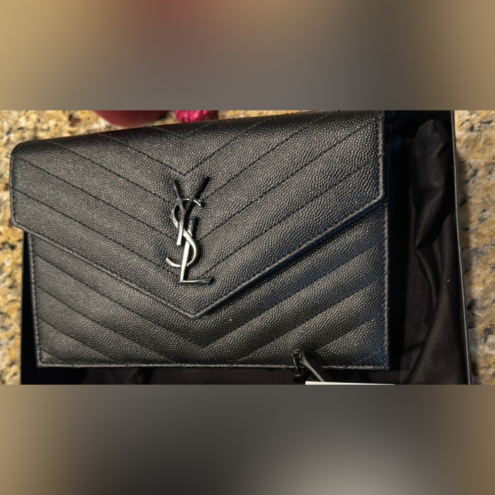 SAINT LAURENT
Cassandre Chain matelassé textured-leather wallet